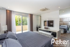 Casa em Condomínio à venda com 457m², 4 dormitórios, 4 suítes, 6 vagas, no bairro Pedra Redonda em PORTO ALEGRE
