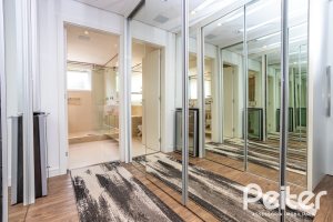 Casa em Condomínio à venda com 457m², 4 dormitórios, 4 suítes, 6 vagas, no bairro Pedra Redonda em PORTO ALEGRE