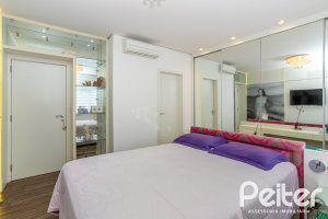 Casa em Condomínio à venda com 457m², 4 dormitórios, 4 suítes, 6 vagas, no bairro Pedra Redonda em PORTO ALEGRE