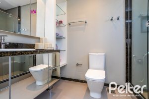Casa em Condomínio à venda com 457m², 4 dormitórios, 4 suítes, 6 vagas, no bairro Pedra Redonda em PORTO ALEGRE