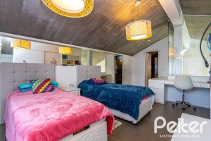 Casa em Condomínio à venda com 457m², 4 dormitórios, 4 suítes, 6 vagas, no bairro Pedra Redonda em PORTO ALEGRE