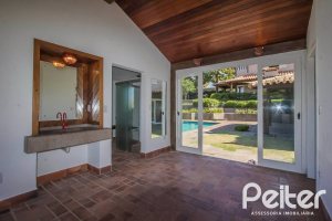 Casa em Condomínio à venda com 830m², 7 dormitórios, 3 suítes, 10 vagas, no bairro Cavalhada em PORTO ALEGRE