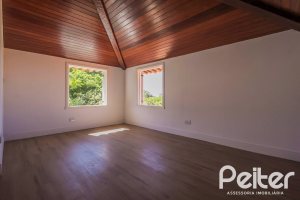 Casa em Condomínio à venda com 830m², 7 dormitórios, 3 suítes, 10 vagas, no bairro Cavalhada em PORTO ALEGRE