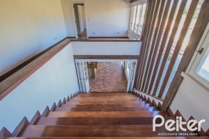 Casa em Condomínio à venda com 830m², 7 dormitórios, 3 suítes, 10 vagas, no bairro Cavalhada em PORTO ALEGRE