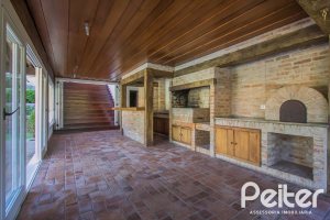 Casa em Condomínio à venda com 830m², 7 dormitórios, 3 suítes, 10 vagas, no bairro Cavalhada em PORTO ALEGRE