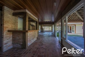 Casa em Condomínio à venda com 830m², 7 dormitórios, 3 suítes, 10 vagas, no bairro Cavalhada em PORTO ALEGRE