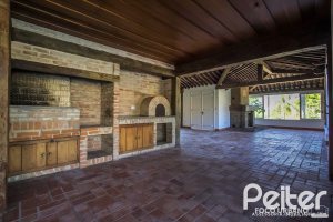 Casa em Condomínio à venda com 830m², 7 dormitórios, 3 suítes, 10 vagas, no bairro Cavalhada em PORTO ALEGRE