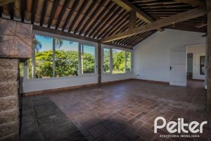 Casa em Condomínio à venda com 830m², 7 dormitórios, 3 suítes, 10 vagas, no bairro Cavalhada em PORTO ALEGRE