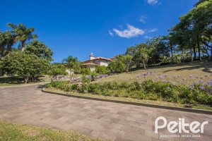 Casa em Condomínio à venda com 830m², 7 dormitórios, 3 suítes, 10 vagas, no bairro Cavalhada em PORTO ALEGRE