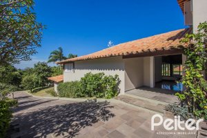 Casa em Condomínio à venda com 830m², 7 dormitórios, 3 suítes, 10 vagas, no bairro Cavalhada em PORTO ALEGRE