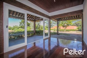 Casa em Condomínio à venda com 830m², 7 dormitórios, 3 suítes, 10 vagas, no bairro Cavalhada em PORTO ALEGRE