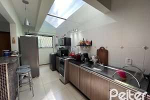Casa em Condomínio à venda com 209m², 4 dormitórios, 1 suíte, 4 vagas, no bairro Tristeza em Porto Alegre