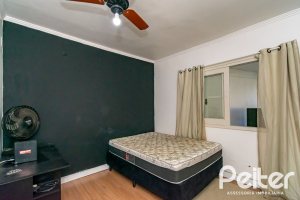 Casa à venda com 185m², 4 dormitórios, 1 suíte, 4 vagas, no bairro Guarujá em Porto Alegre