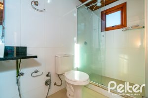 Casa à venda com 215m², 3 dormitórios, 3 suítes, 2 vagas, no bairro Tristeza em Porto Alegre