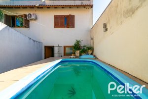 Casa à venda com 215m², 3 dormitórios, 3 suítes, 2 vagas, no bairro Tristeza em Porto Alegre