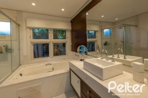 Casa em Condomínio à venda com 460m², 3 dormitórios, 3 suítes, 6 vagas, no bairro Terra Ville em PORTO ALEGRE