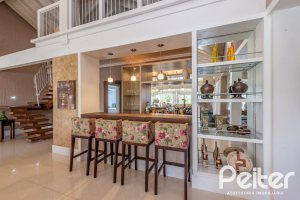 Casa em Condomínio à venda com 460m², 3 dormitórios, 3 suítes, 6 vagas, no bairro Terra Ville em PORTO ALEGRE