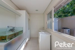 Casa em Condomínio à venda com 460m², 3 dormitórios, 3 suítes, 6 vagas, no bairro Terra Ville em PORTO ALEGRE