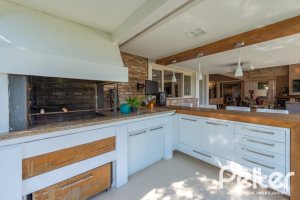 Casa em Condomínio à venda com 460m², 3 dormitórios, 3 suítes, 6 vagas, no bairro Terra Ville em PORTO ALEGRE