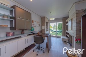 Casa em Condomínio à venda com 460m², 3 dormitórios, 3 suítes, 6 vagas, no bairro Terra Ville em PORTO ALEGRE