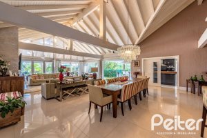 Casa em Condomínio à venda com 460m², 3 dormitórios, 3 suítes, 6 vagas, no bairro Terra Ville em PORTO ALEGRE