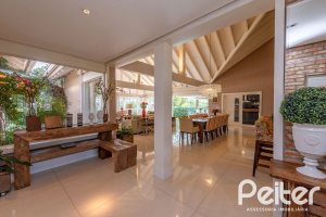 Casa em Condomínio à venda com 460m², 3 dormitórios, 3 suítes, 6 vagas, no bairro Terra Ville em PORTO ALEGRE