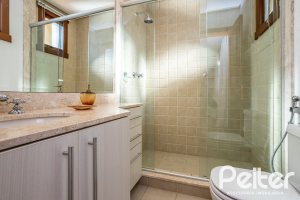 Casa em Condomínio à venda com 384m², 3 dormitórios, 3 suítes, 4 vagas, no bairro Terra Ville em PORTO ALEGRE