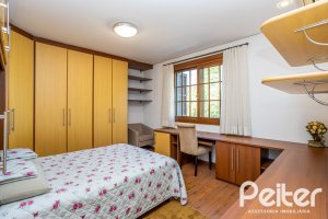 Casa em Condomínio à venda com 384m², 3 dormitórios, 3 suítes, 4 vagas, no bairro Terra Ville em PORTO ALEGRE