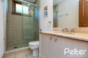 Casa em Condomínio à venda com 384m², 3 dormitórios, 3 suítes, 4 vagas, no bairro Terra Ville em PORTO ALEGRE