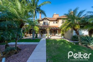 Casa em Condomínio à venda com 384m², 3 dormitórios, 3 suítes, 4 vagas, no bairro Terra Ville em PORTO ALEGRE