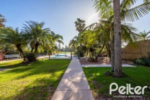 Casa em Condomínio à venda com 384m², 3 dormitórios, 3 suítes, 4 vagas, no bairro Terra Ville em PORTO ALEGRE