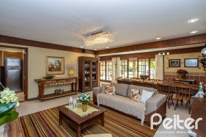 Casa em Condomínio à venda com 384m², 3 dormitórios, 3 suítes, 4 vagas, no bairro Terra Ville em PORTO ALEGRE