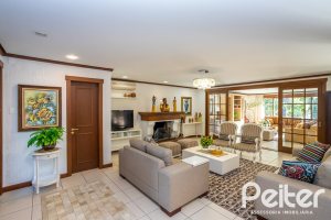 Casa em Condomínio à venda com 384m², 3 dormitórios, 3 suítes, 4 vagas, no bairro Terra Ville em PORTO ALEGRE