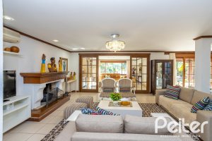 Casa em Condomínio à venda com 384m², 3 dormitórios, 3 suítes, 4 vagas, no bairro Terra Ville em PORTO ALEGRE