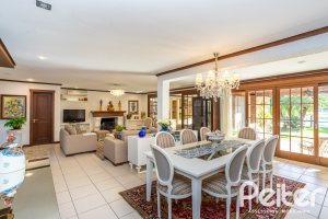 Casa em Condomínio à venda com 384m², 3 dormitórios, 3 suítes, 4 vagas, no bairro Terra Ville em PORTO ALEGRE