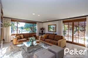 Casa em Condomínio à venda com 384m², 3 dormitórios, 3 suítes, 4 vagas, no bairro Terra Ville em PORTO ALEGRE