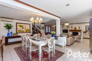 Casa em Condomínio à venda com 384m², 3 dormitórios, 3 suítes, 4 vagas, no bairro Terra Ville em PORTO ALEGRE