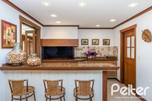 Casa em Condomínio à venda com 384m², 3 dormitórios, 3 suítes, 4 vagas, no bairro Terra Ville em PORTO ALEGRE