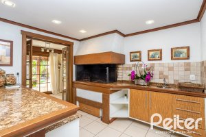 Casa em Condomínio à venda com 384m², 3 dormitórios, 3 suítes, 4 vagas, no bairro Terra Ville em PORTO ALEGRE