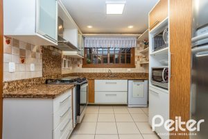 Casa em Condomínio à venda com 384m², 3 dormitórios, 3 suítes, 4 vagas, no bairro Terra Ville em PORTO ALEGRE