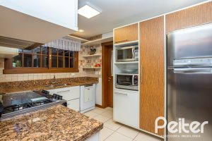 Casa em Condomínio à venda com 384m², 3 dormitórios, 3 suítes, 4 vagas, no bairro Terra Ville em PORTO ALEGRE