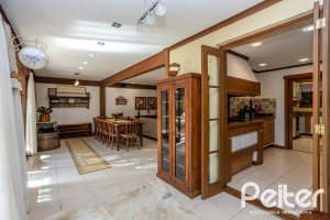 Casa em Condomínio à venda com 384m², 3 dormitórios, 3 suítes, 4 vagas, no bairro Terra Ville em PORTO ALEGRE