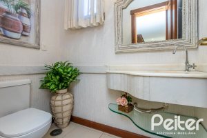 Casa em Condomínio à venda com 384m², 3 dormitórios, 3 suítes, 4 vagas, no bairro Terra Ville em PORTO ALEGRE