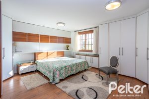 Casa em Condomínio à venda com 384m², 3 dormitórios, 3 suítes, 4 vagas, no bairro Terra Ville em PORTO ALEGRE