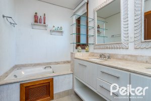 Casa em Condomínio à venda com 384m², 3 dormitórios, 3 suítes, 4 vagas, no bairro Terra Ville em PORTO ALEGRE