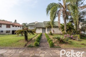 Casa em Condomínio à venda com 450m², 3 dormitórios, 1 suíte, 6 vagas, no bairro Cavalhada em PORTO ALEGRE