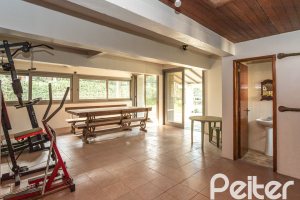 Casa em Condomínio à venda com 450m², 3 dormitórios, 1 suíte, 6 vagas, no bairro Cavalhada em PORTO ALEGRE