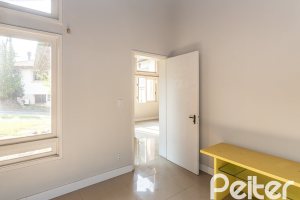 Casa em Condomínio à venda com 450m², 3 dormitórios, 1 suíte, 6 vagas, no bairro Cavalhada em PORTO ALEGRE