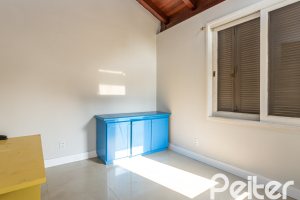 Casa em Condomínio à venda com 450m², 3 dormitórios, 1 suíte, 6 vagas, no bairro Cavalhada em PORTO ALEGRE