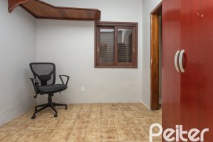 Casa em Condomínio à venda com 450m², 3 dormitórios, 1 suíte, 6 vagas, no bairro Cavalhada em PORTO ALEGRE